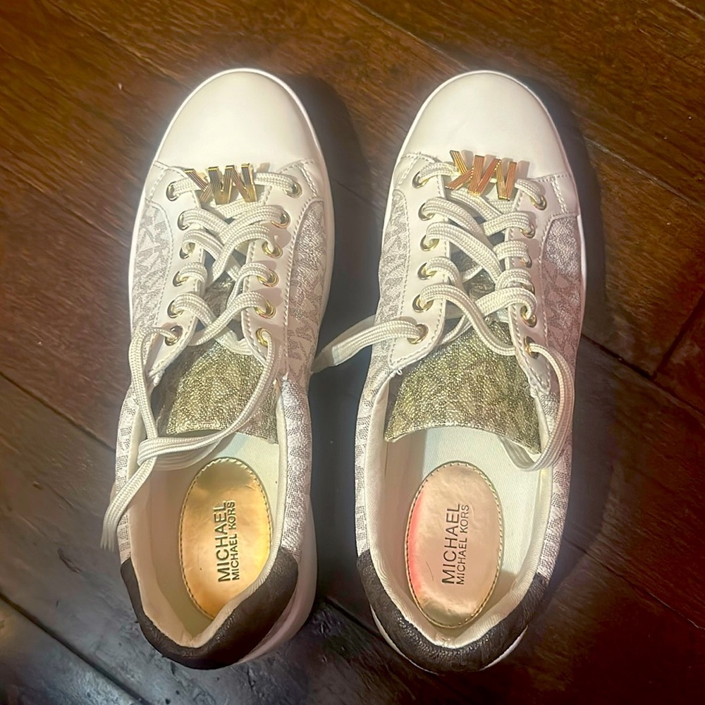 MICHAEL KORS SNEAKERS ONLY WORN ABOUT 5 times willing to negotiate pricing :)